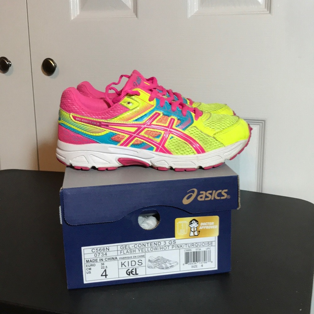 Gently used ASICS size 4 yellow, pink, turquoise